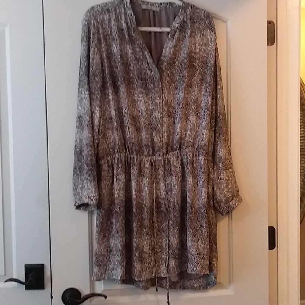 Long sleeve, snake skin, draw string dress.
